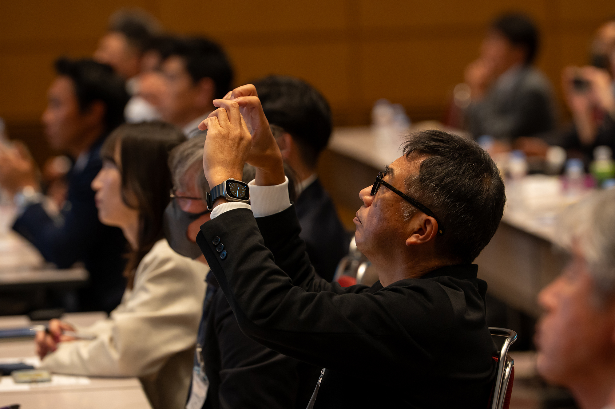 写真撮影をしている加盟店